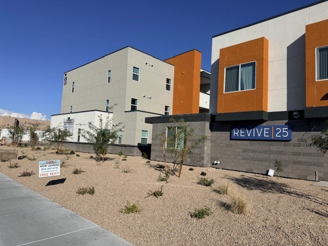 Building exterior at Revive 25 Apartments.