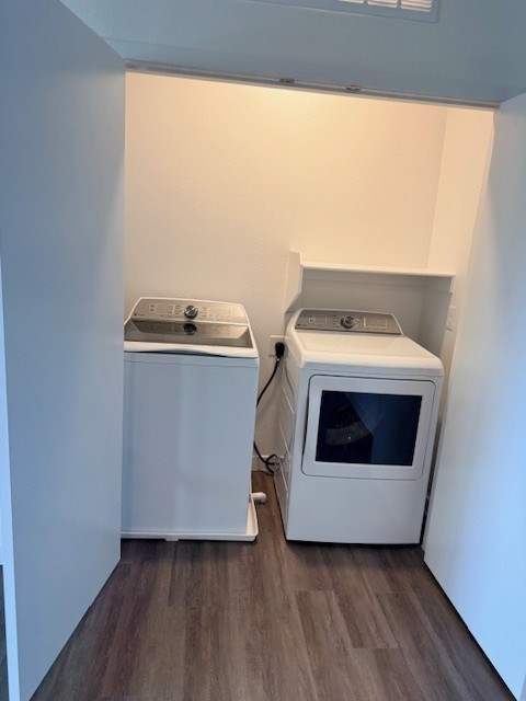 A small kitchen with a microwave and a dishwasher.
