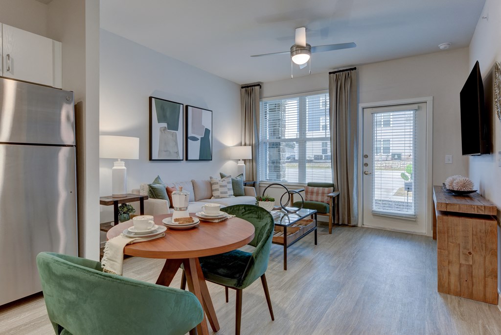 an open living room and dining room with a table and chairs at Estraya Boerne, Boerne, TX, 78006