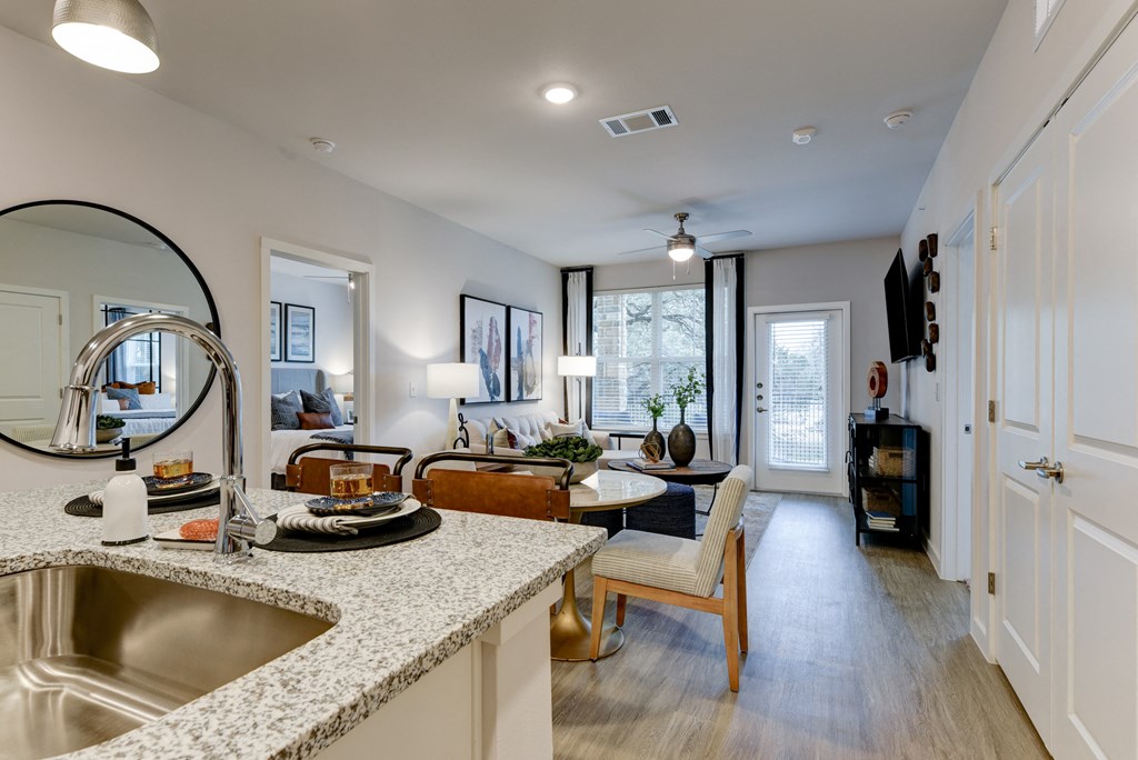 a living room with a couch and a table at Estraya Boerne, Texas