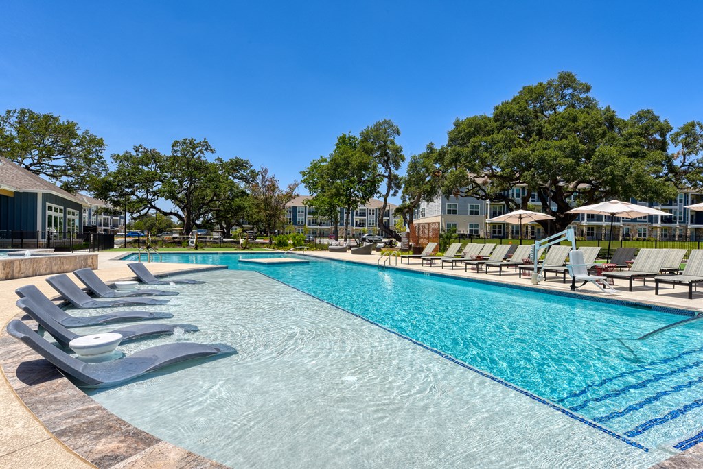 the pool at the preserve at ballantyne commons apartments at Estraya Boerne, Texas