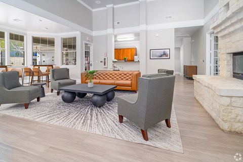 A living room with a grey sofa and a coffee table.