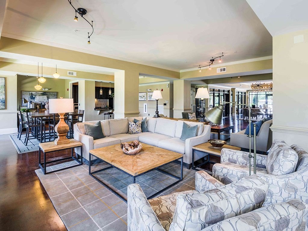 a living room with couches and a coffee table