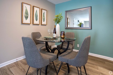 A dining room with a table and chairs.at Addison at Sutherland, Knoxville Tennessee  