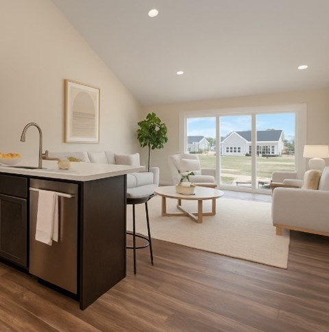 A modern kitchen with a large window overlooking a house.