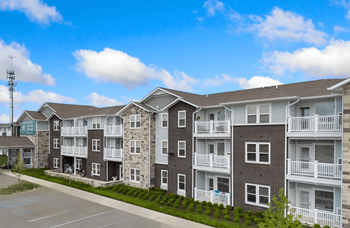 an exterior view of an apartment building on a street at 41 North Senior Living Apartments, Indiana 46835