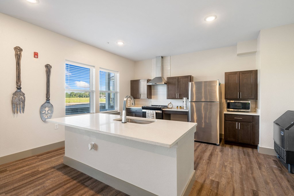 Community kitchen and stainless steel appliances at 41 North Apartments, Indiana