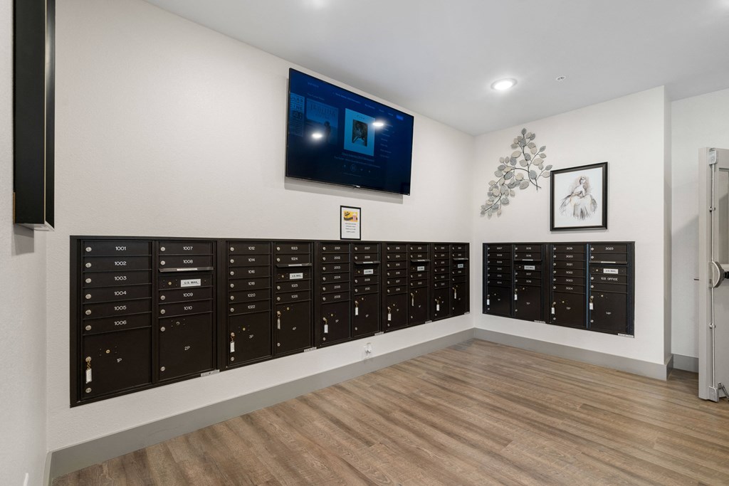 room with lockers and a television on the wall at 41 North Apartments, Fort Wayne, 46835