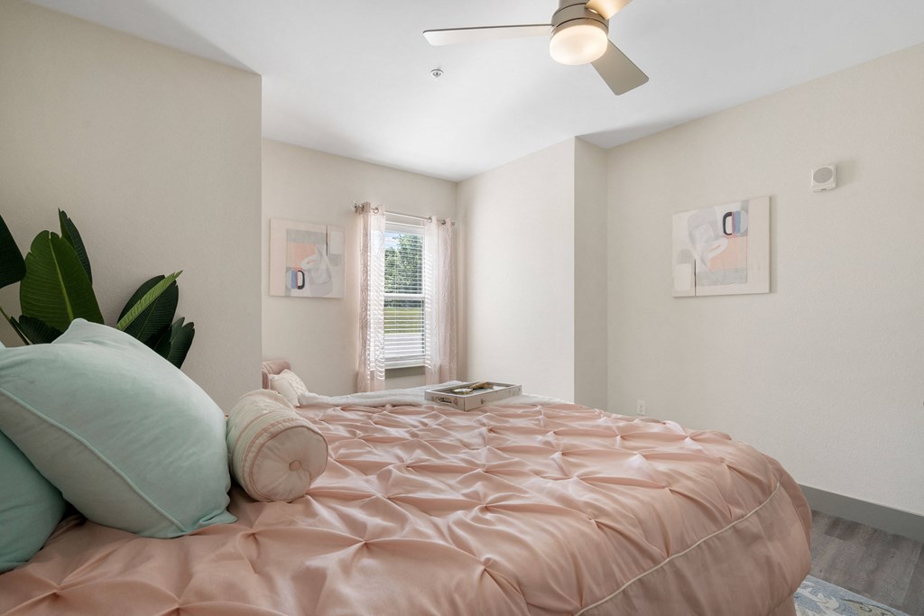 Bedroom with bed and window at 41 North Apartments, Fort Wayne, IN