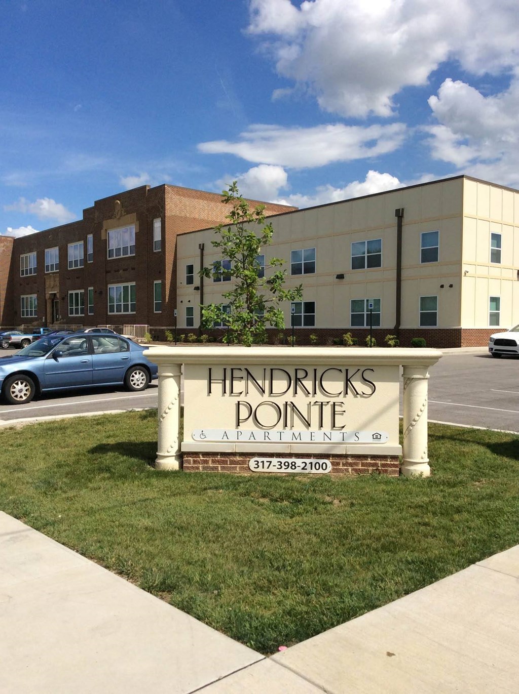 a sign in front of a building  at Hendricks Pointe Apts, Shelbyville, 46176