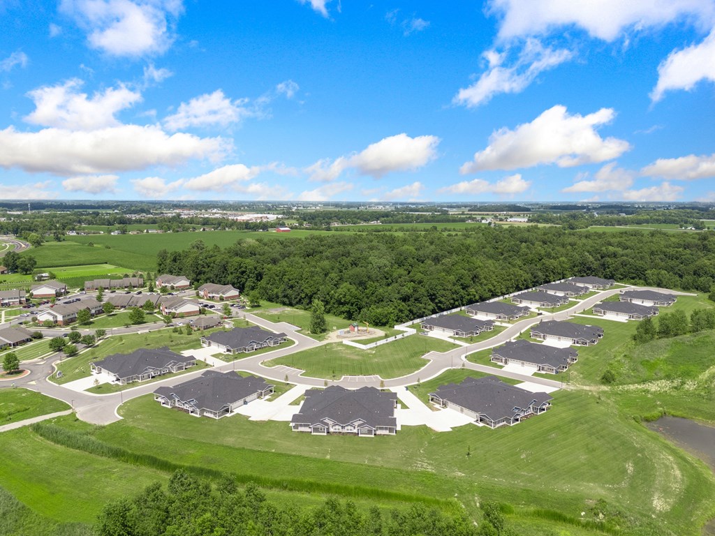 an aerial view of a neighborhood with houses and green grass at Morada at Maysville, Indiana