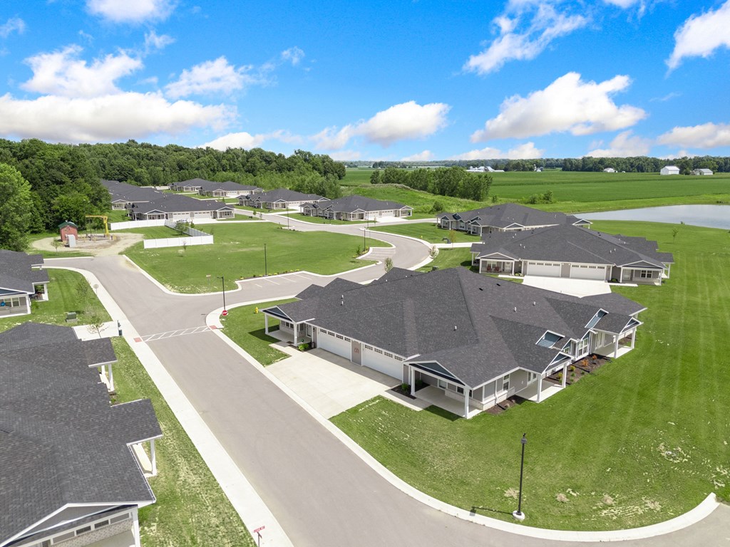 an aerial view of a group of houses in a neighborhood at Morada at Maysville, Fort Wayne, IN