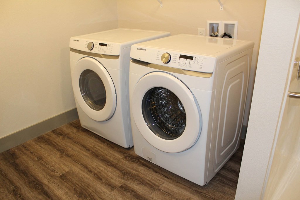 a washer and dryer in a laundry room  at Haven Homes Apartments, LP, Plainfield, IN