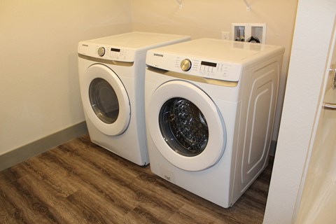 a washer and dryer in a laundry room