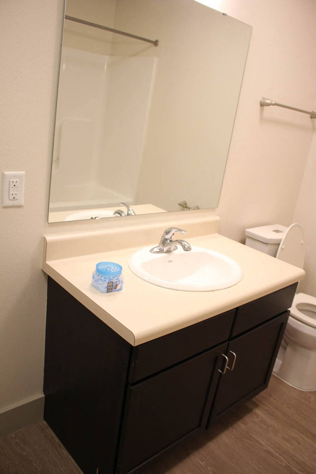 a bathroom with a sink and a toilet at Salem Place Apartments, Daleville, Indiana