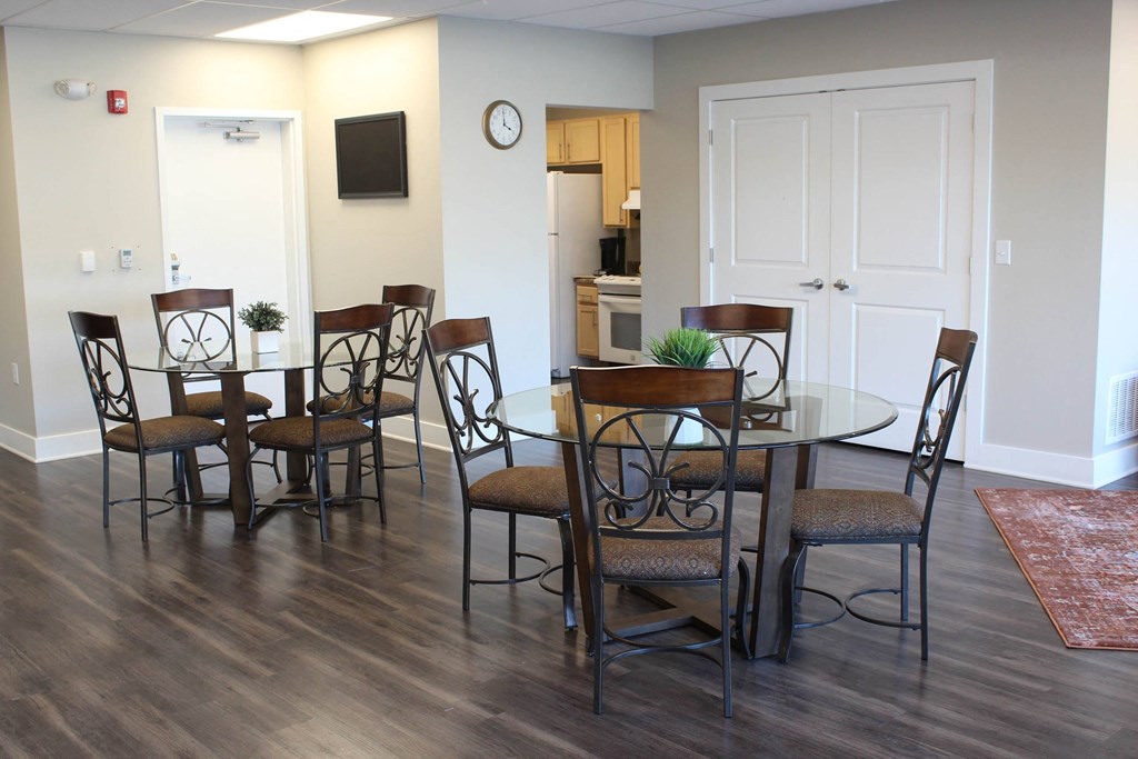 a dining room with a table and chairs  at North Harrison Senior Apts, Shelbyville, 46176