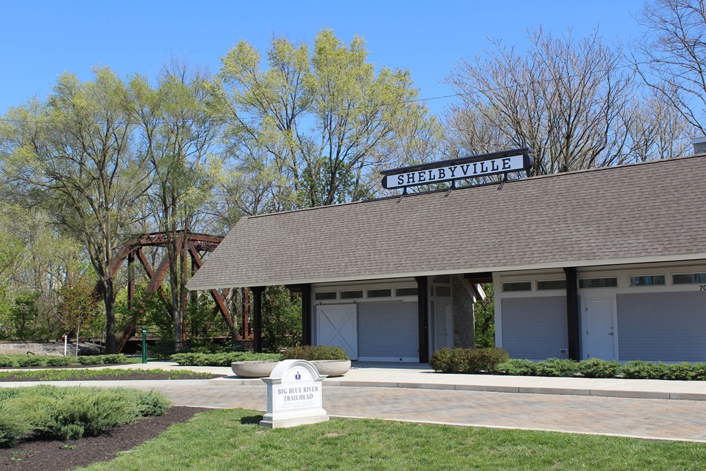 a building with a sign on it in front of a bridge at North Harrison Senior Apts, Shelbyville