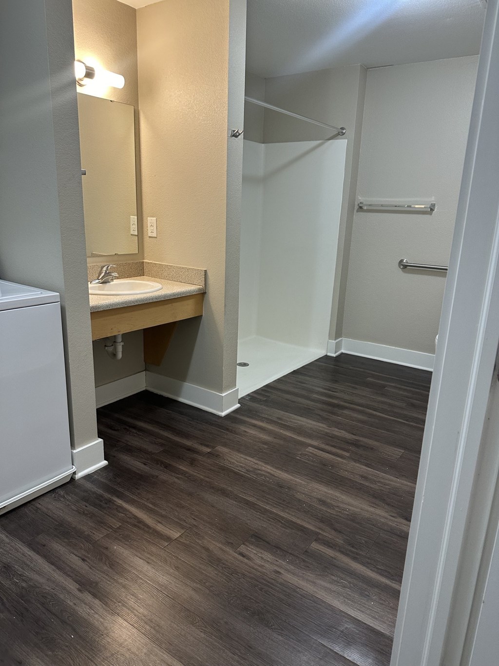 A small bathroom with a sink and a toilet.