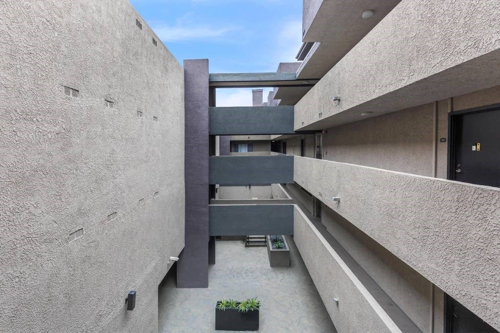modern concrete building with a view of the sky