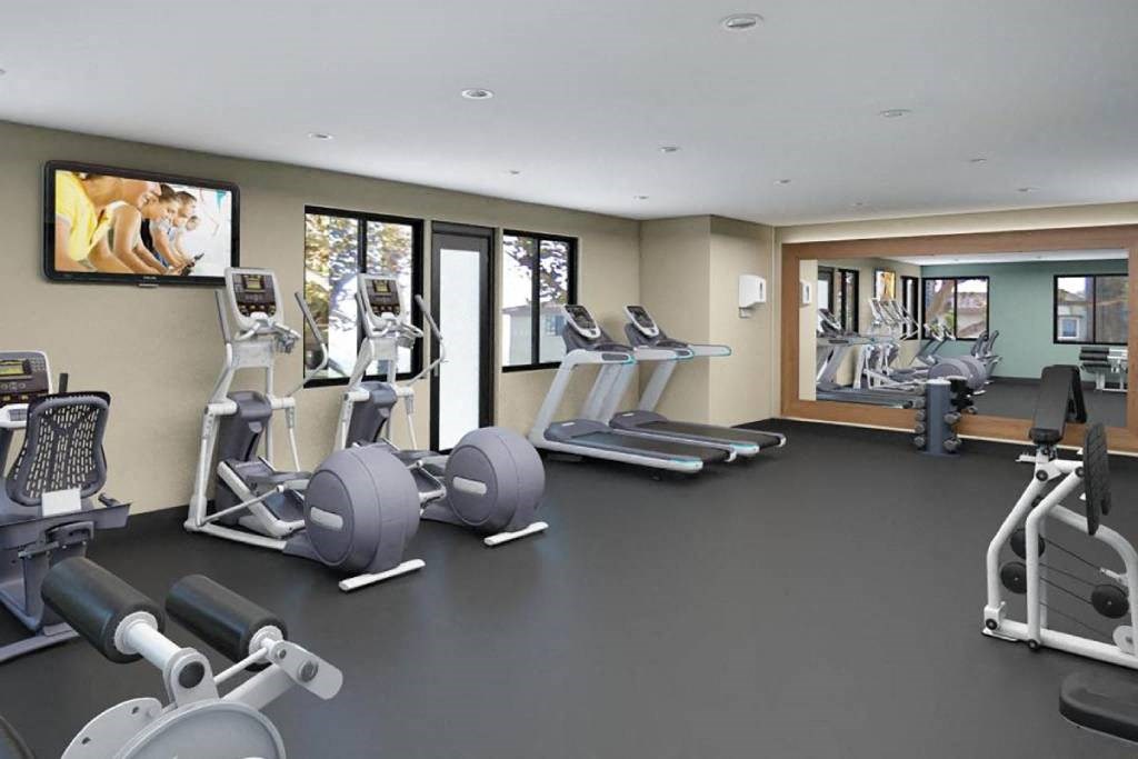 the gym is equipped with a variety of weights and cardio equipment