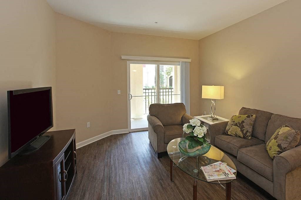 a living room with a couch and a television
