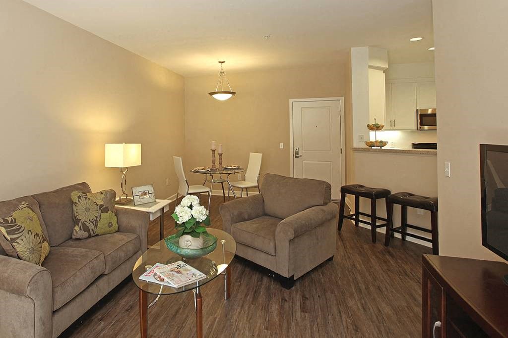 a living room with a couch and a table