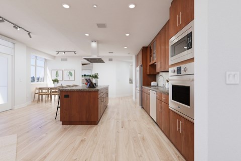 A modern kitchen with wooden cabinets and a center island.