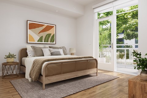 A bedroom with a large bed and a painting on the wall.