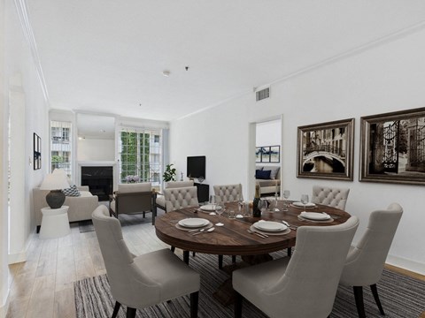 A dining room with a table set for six.