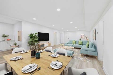 A modern dining room with a wooden table set for six.