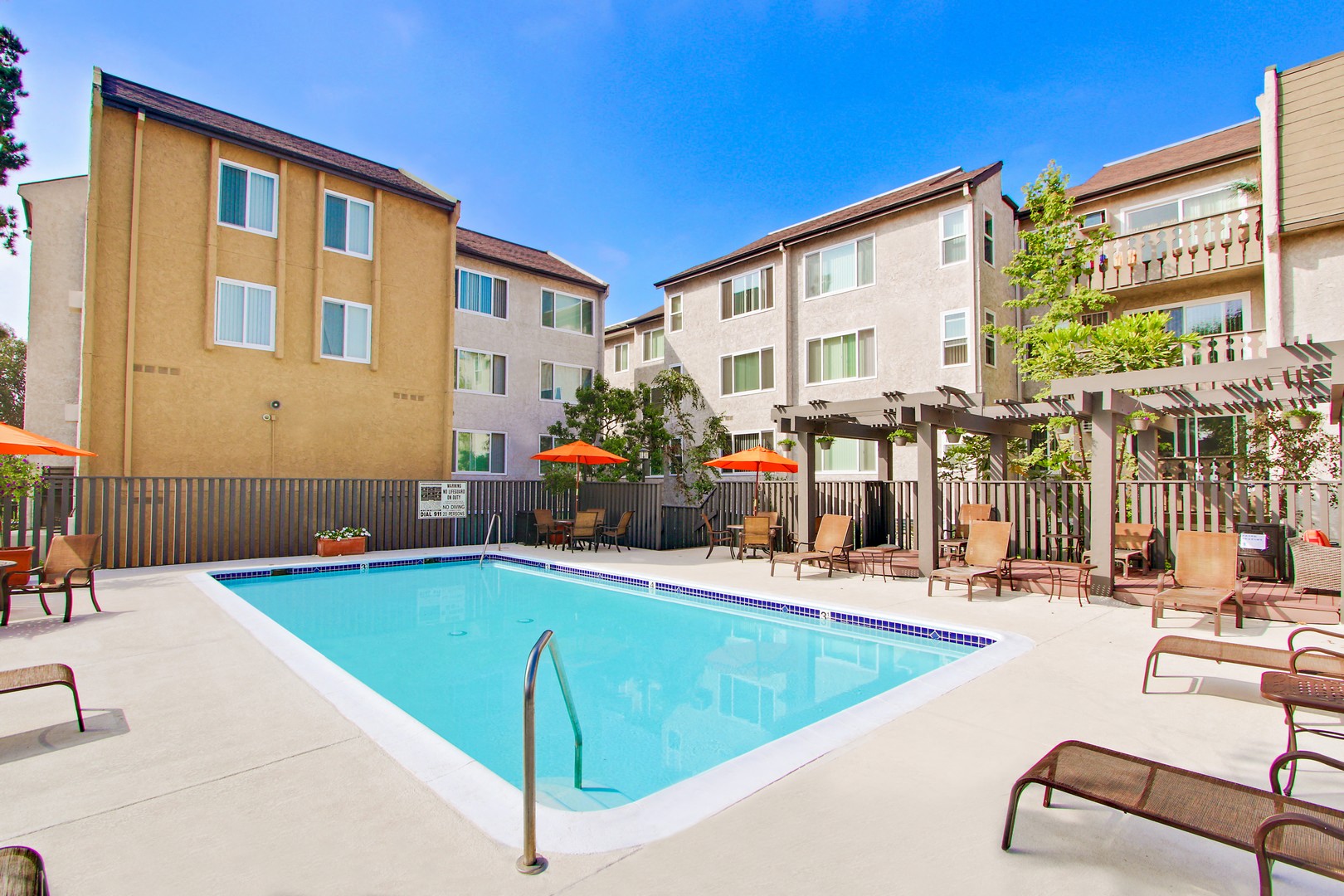Courtyard resort-style swimming pool, lounges, picnic area on the side