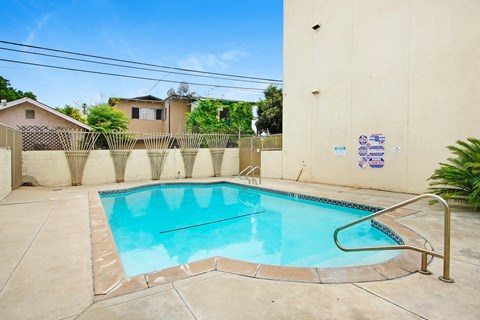 the swimming pool at the villa apartments