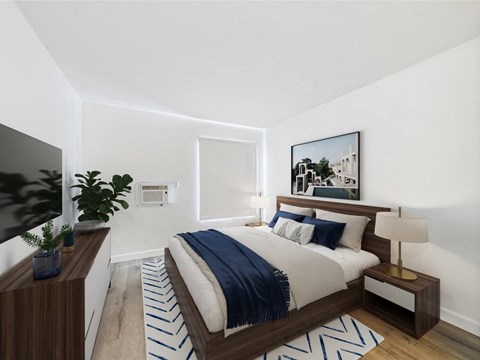 A modern bedroom with a large bed and a painting on the wall.