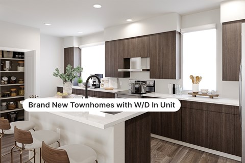 A modern kitchen with brown and white cabinetry and a central island.