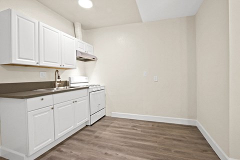 the preserve at ballantyne commons apartment kitchen with white cabinets