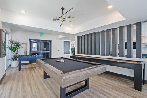 our apartments have a game room with a foosball table and a ping pong table