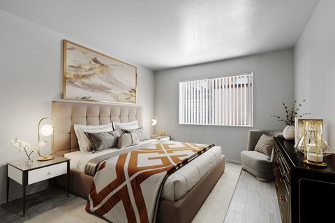 A bedroom with a large bed and a painting on the wall.