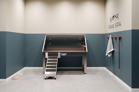 a desk with a sink and a towel rack