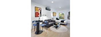 a living room with a couch and a table