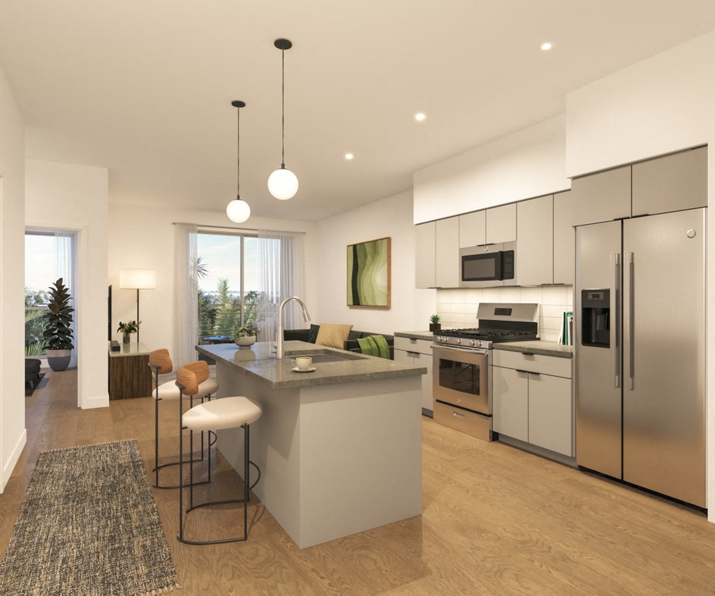 a rendering of a kitchen and living room with stainless steel appliances