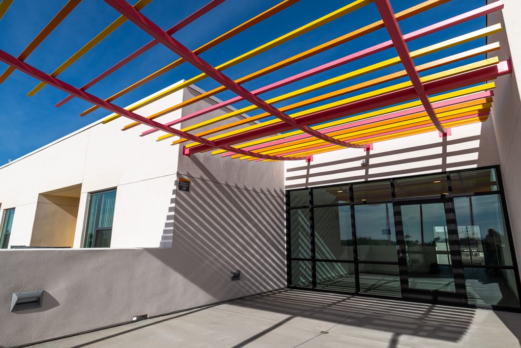 A building with a colorful roof structure.