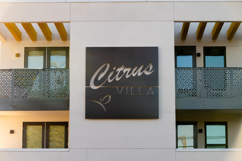 A building with a sign that says Cirrus Villa.