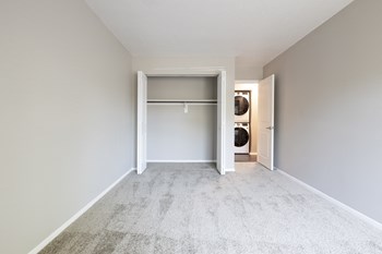 Second Bedroom with Closet in the Two Bedroom Two Bath Apartment at Woodbridge Apartments Bloomington - Photo Gallery 50