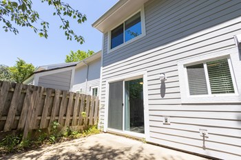 Enclosed Patio in the Two Bedroom Townhome at Woodbridge Bloomington - Photo Gallery 45