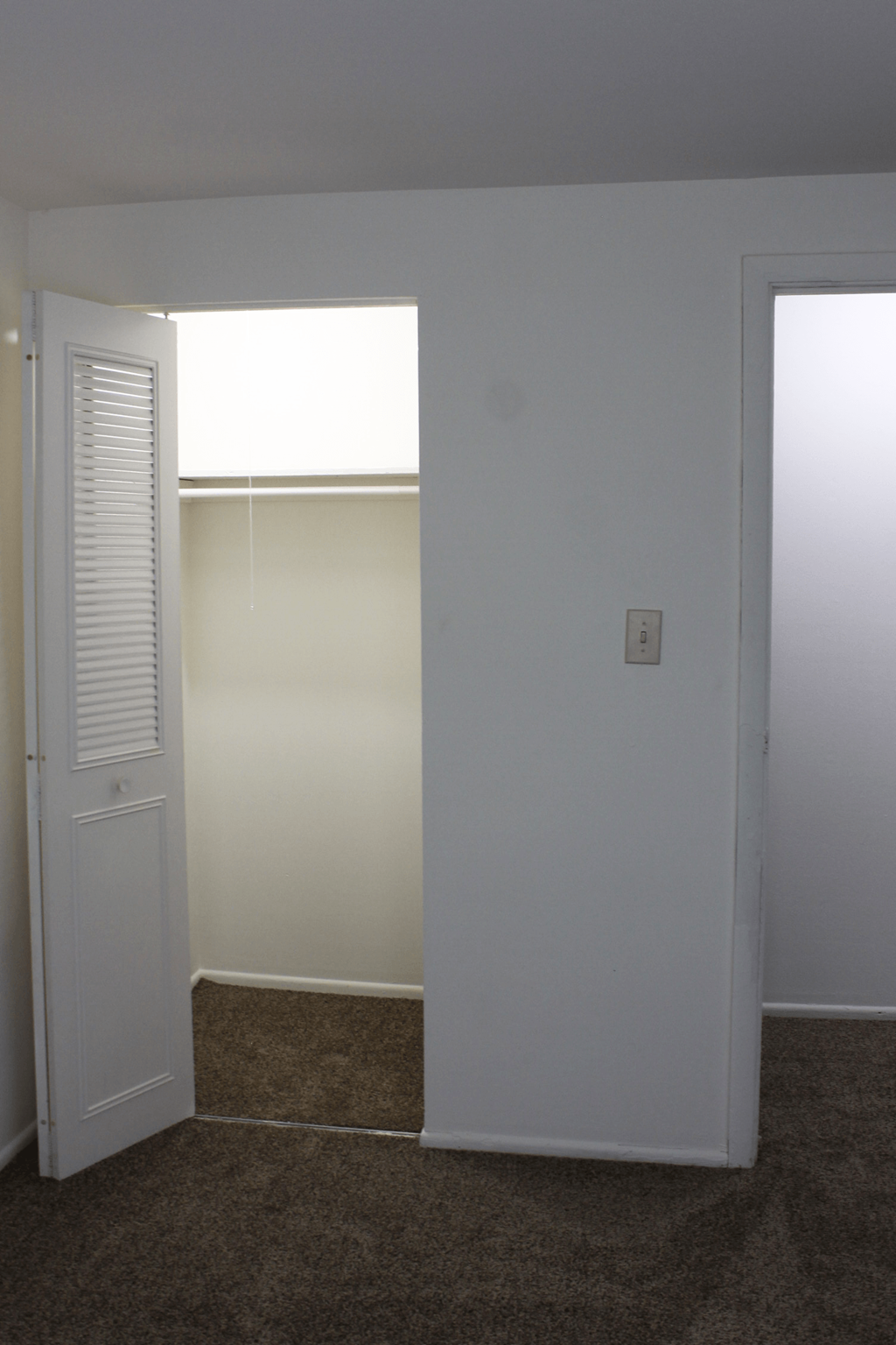 Bedroom with a closet in a 3 bedroom townhome at Carriage House West.