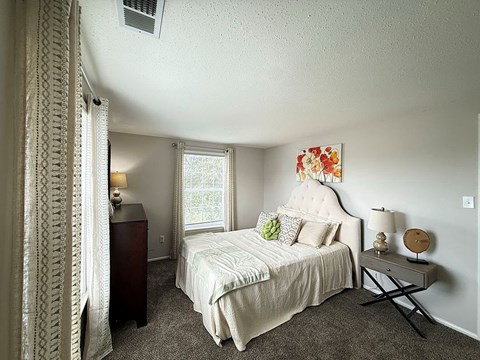 Spacious Bedroom with a Window in a One Bedroom Apartment at Ashmore Trace