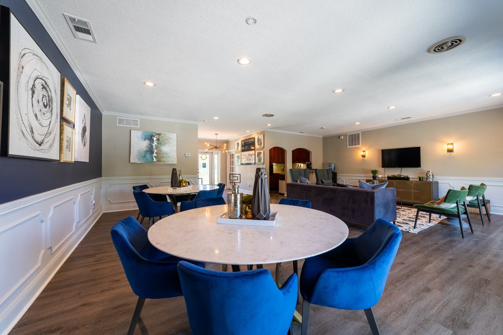 Clubhouse at Ashton Brook Apartments with an open floorplan and ample seating