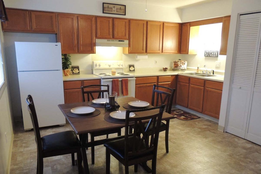 Kitchen with eat in dining at Country View Apartments