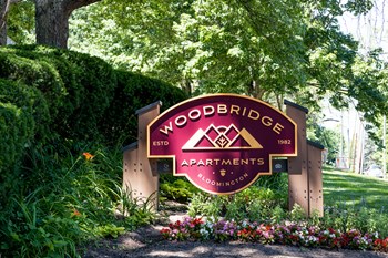 Exterior Sign at Woodbridge Apartments Bloomington - Photo Gallery 61