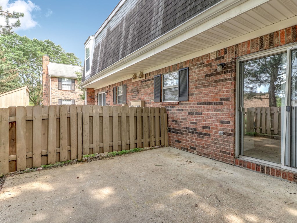 Fenced outdoor patio at Ashley Pointe Apartments